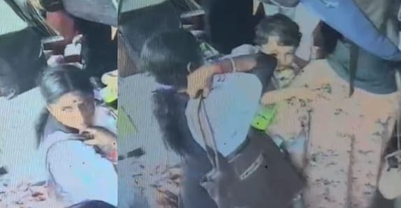 അമ്മയുടെ പിന്നാലെ നടന്നു; ആരും കാണാതെ കുഞ്ഞിന്റെ മാല കവർന്ന് യുവതി: സിസിടിവിയിൽ പെട്ടു